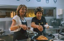Paella cooking class with central market tour