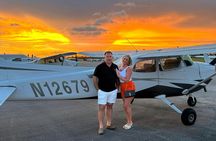 Miami night lights plane tour with champagne