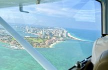 Miami beach private plane tour with drinks