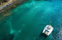 Catamaran cruise along Santorini's coastline from Fira