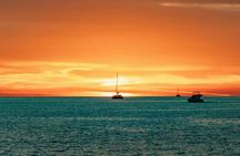 Private sailing catamaran cruise with meal in Santorini