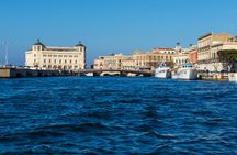 Ortigia coastline exploration by private boat with seafood appetisers