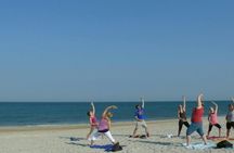 Yoga session on the beach of the island of Sylt
