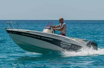 Half-day boat adventure in Milos with optional skipper