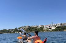 Guided transparent kayak tour in the bay of Addaia in Menorca