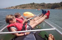 Guided transparent kayak tour in the bay of Addaia in Menorca