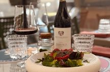 Food tour of traditional eateries and wine pairings