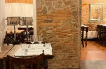 Food tour of traditional eateries and wine pairings