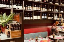 Food tour of traditional eateries and wine pairings