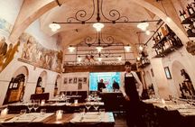 Food tour of traditional eateries and wine pairings