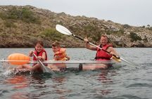 Guided transparent kayak tour in the bay of Addaia in Menorca