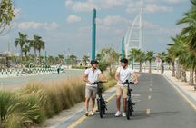 Dubai e-bike journey with old town, beachside and desert tour options