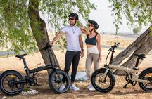 Dubai e-bike journey with old town, beachside and desert tour options