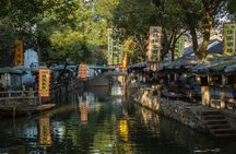 Suzhou Classical Gardens and Water Town visit with pick-up