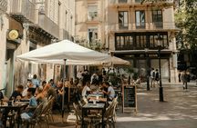 Barcelona district tour with traditional tapas tasting