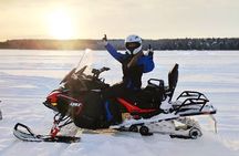 Snowmobile small-group winter safari with BBQ from Rovaniemi