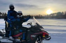 Snowmobile small-group winter safari with BBQ from Rovaniemi