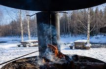 Snowshoe small-group adventure with BBQ at Vikaköngäs from Rovaniemi