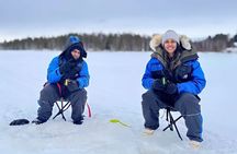 Ice fishing small group experience with BBQ from Rovaniemi