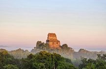 Explore ancient Maya temples on this Tikal sunset tour
