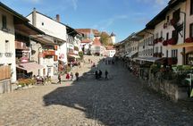 Gruyères, cheese museum and chocolate factory tour from Lausanne by bus