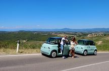 Tuscany e-car excursion with wine tour from Florence