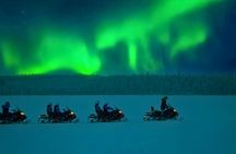 Evening snowmobile safari and Northern Lights tour in Rovaniemi