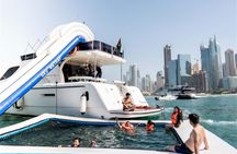 Yacht sailing with waterslides and BBQ from Dubai Harbour