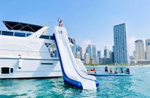 Yacht sailing with waterslides and BBQ from Dubai Harbour