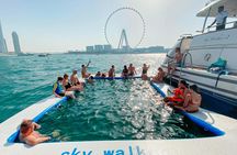 Yacht sailing with waterslides and BBQ from Dubai Harbour