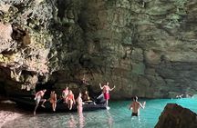 Guided boat trip to Grama Bay