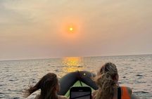 Guided boat trip to Grama Bay