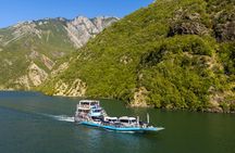 Guided day trip in Koman Lake with boat ride and kayak