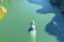 Guided day trip in Koman Lake with boat ride and kayak