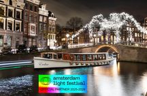 Amsterdam Light Festival canal cruise on a luxury boat with drinks