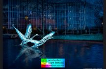 Amsterdam Light Festival canal cruise on a luxury boat with drinks