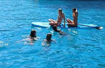 Morning half-day private yacht cruise in Milos