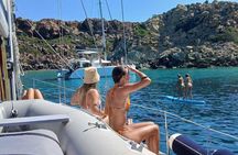 Morning half-day private yacht cruise in Milos