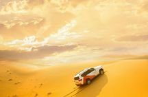 Morning desert safari with dune bashing, sandboarding, and camel ride