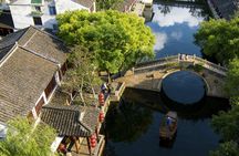 Suzhou Classical Gardens and Water Town visit with pick-up