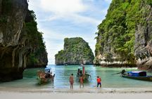 Phi Phi cove collection with traditional longtail boat from Krabi