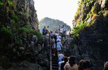 Phi Phi cove collection with traditional longtail boat from Krabi