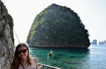 Phi Phi cove collection with traditional longtail boat from Krabi