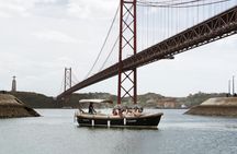 Lisbon sunset cruise with traditional buffet and open bar