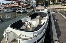 Cruise on a luxury boat with pastel de nata and coffee in Lisbon