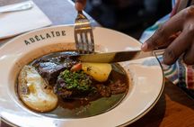 Traditional food tour in Montmartre neighborhood
