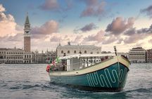Murano, Burano and Torcello, the Venetian lagoon on a traditional boat