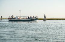 Murano, Burano and Torcello, the Venetian lagoon on a traditional boat