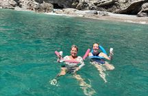 Cagliari small-group boat escape to Sella del Diavolo with swim stops