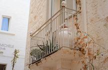 Castellana Caves guided tour and free time in Polignano a Mare from Bari